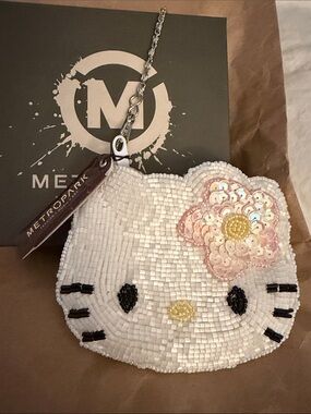 Vintage Hello Kitty coin purse with wristlet chain. Never used.
